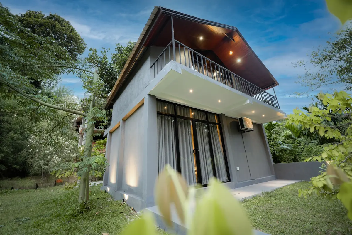 Guest accommodation building surrounded by trees at Hanthana SK Paradise